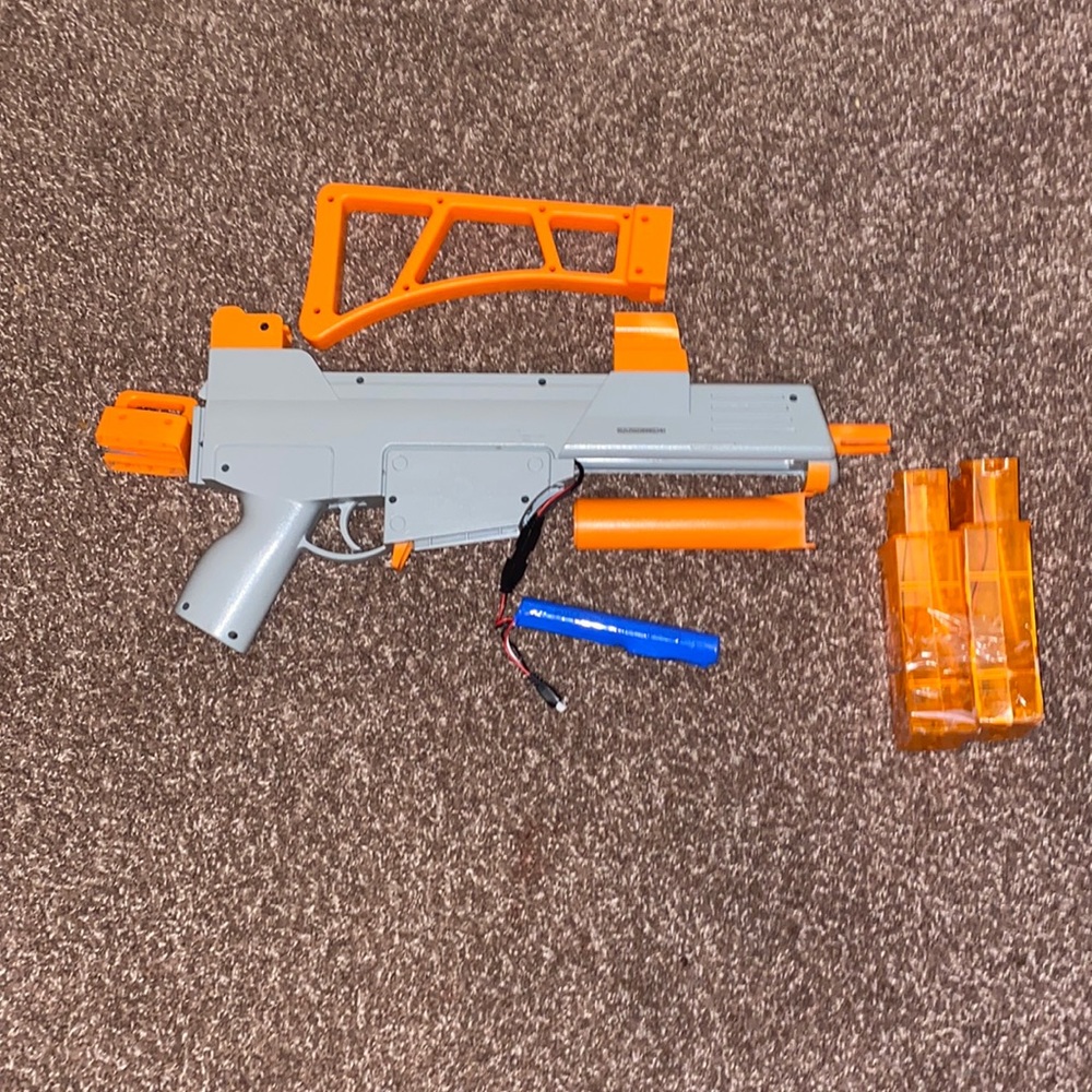 This is a Splatterball gun it’s orange and grey